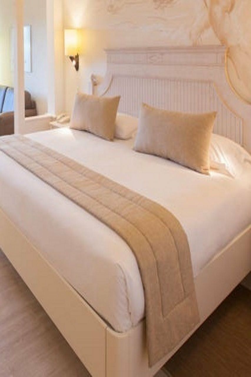 מלונראס Lopesan Villa Del Conde Resort & Thalasso מראה חיצוני תמונה A bed runner